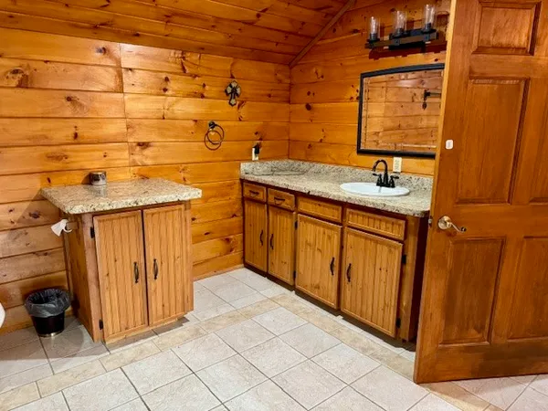 a view of an front door and a yard