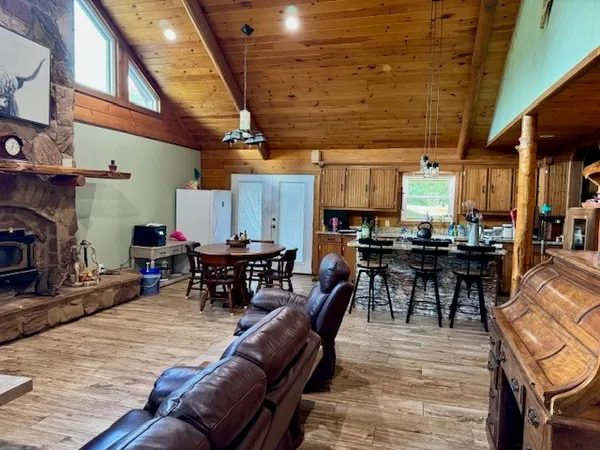 a view of a kitchen with granite countertop lots of clutter