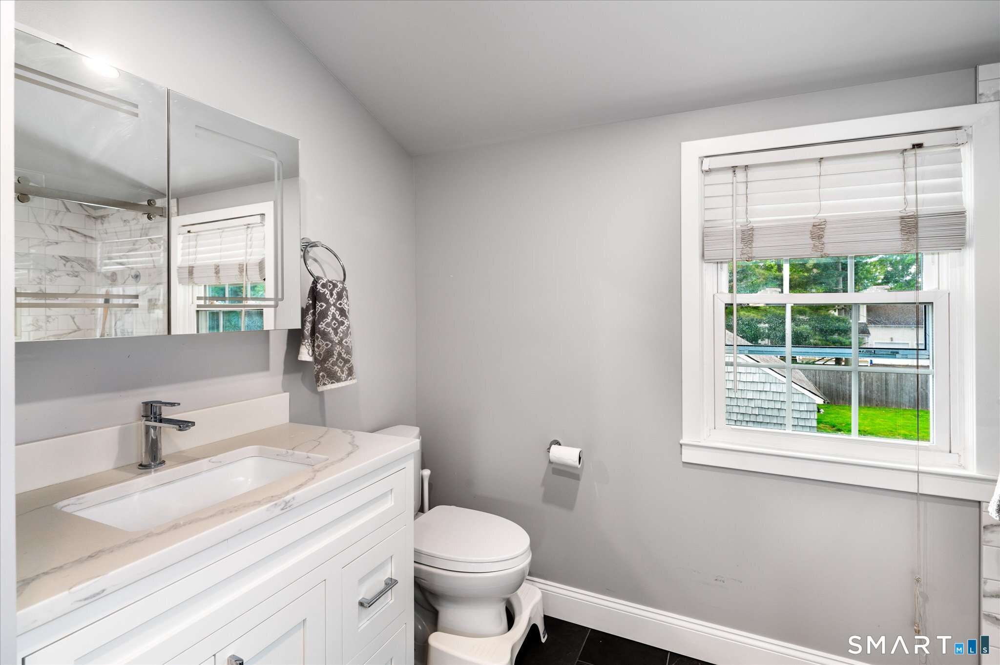 250 High Ridge Road Stamford, CT 06905 - Photo 12 of 22 Beautiful new primary bath with heated floor, walk in shower and all new fixtures