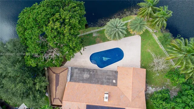 a view of an empty room with a fireplace