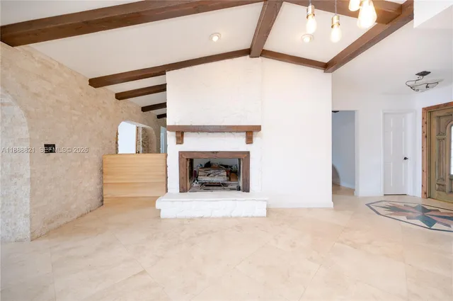 a view of a house with swimming pool and sitting area