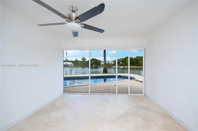 a view of an empty room with a balcony