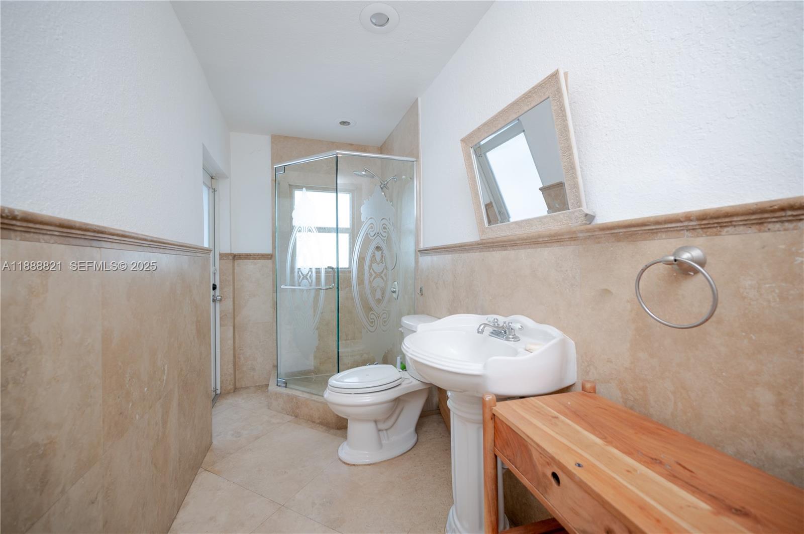 9881 Southwest 1st Court Plantation, FL 33324 - Photo 9 of 52 a bathroom with a toilet a sink and shower