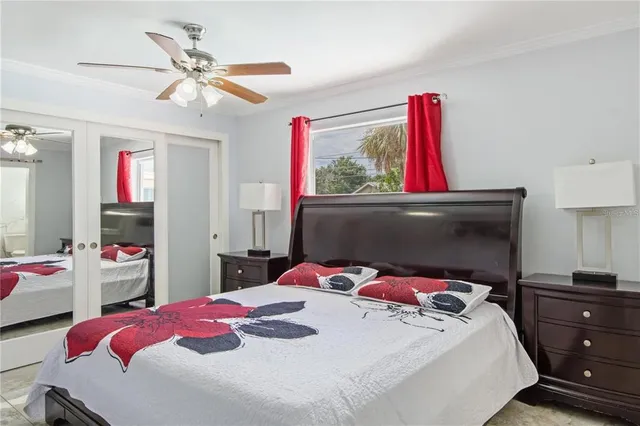 a bedroom with a bed and a closet