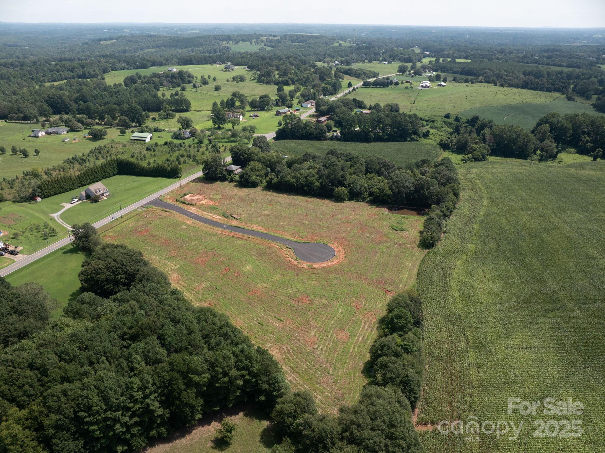 Lot 8-809 Eagle View Lane Lawndale, NC 28090 - Photo 12 of 12 an aerial view of a house with a yard