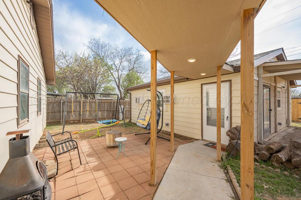 2910 Browning Street Amarillo, TX 79103 - Photo 21 of 28 a building outdoor space with patio furniture and potted plants