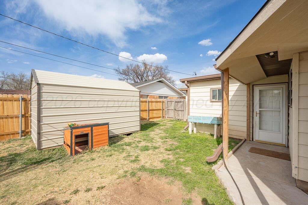 2910 Browning Street Amarillo, TX 79103 - Photo 24 of 28 a view of a porch with a table and chairs