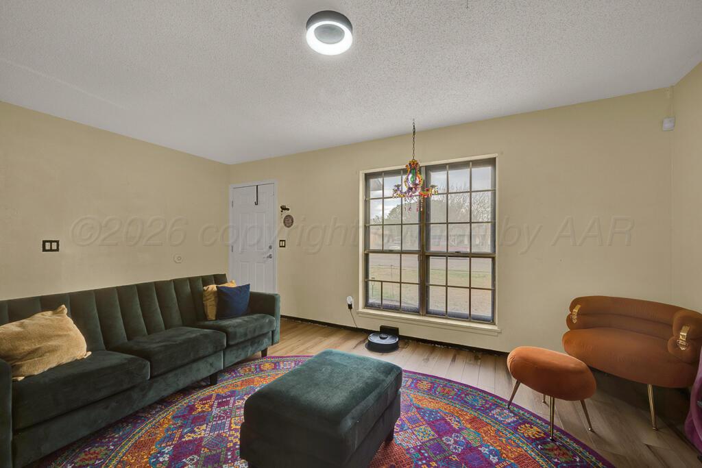 2910 Browning Street Amarillo, TX 79103 - Photo 5 of 28 a living room with furniture and a window