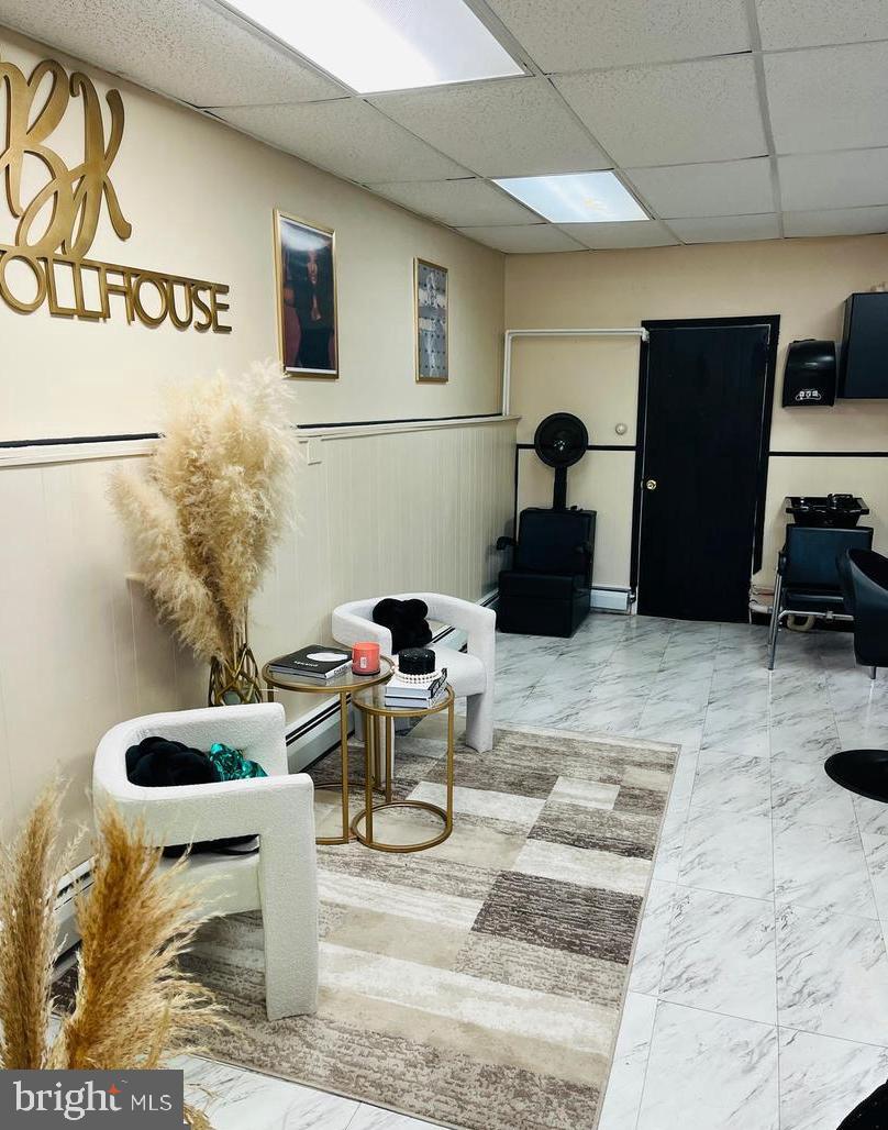 424 North Springfield Road Clifton Heights, PA 19018 - Photo 21 of 24 a living room with furniture and a potted plant
