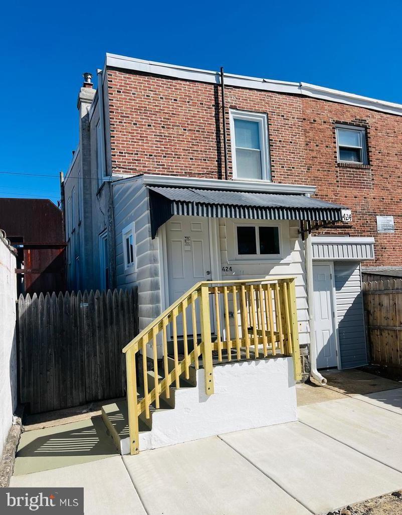 424 North Springfield Road Clifton Heights, PA 19018 - Photo 24 of 24 a view of balcony with small white wall and wooden fence