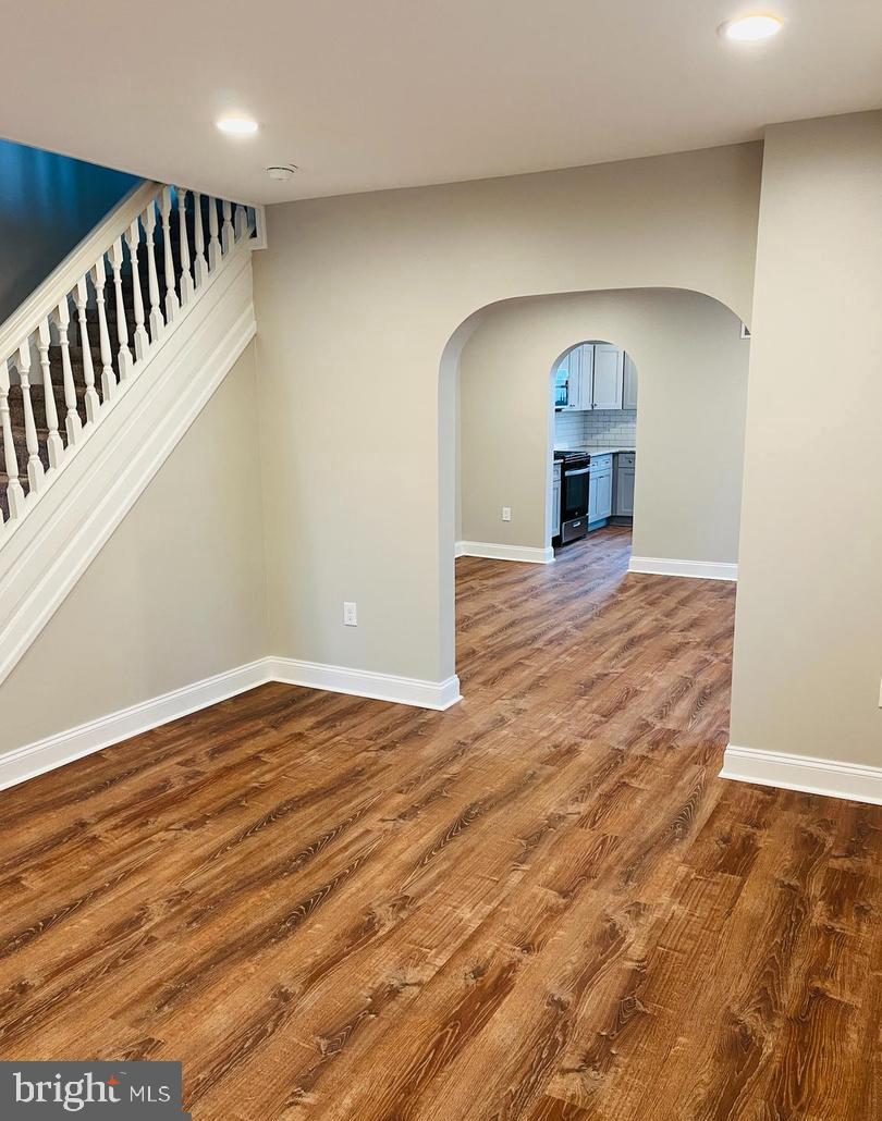 424 North Springfield Road Clifton Heights, PA 19018 - Photo 6 of 24 a view of empty room with wooden floor