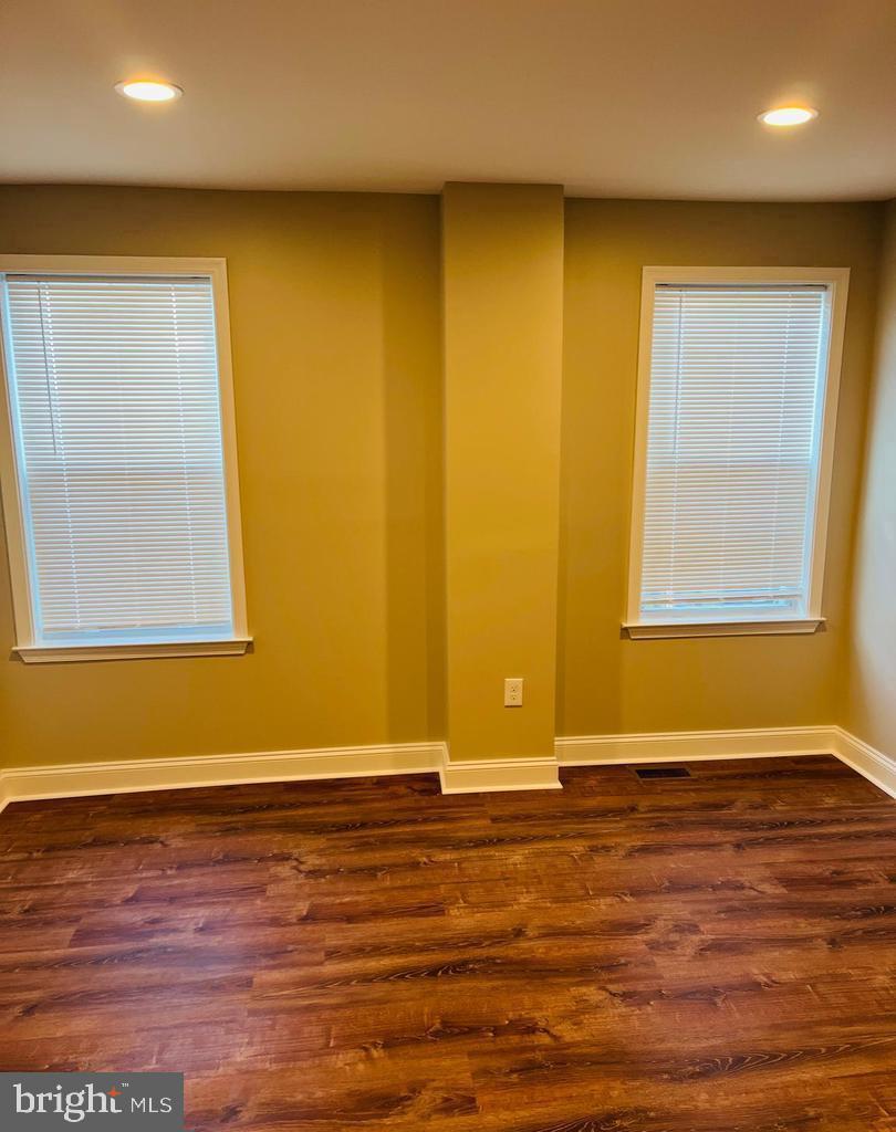 424 North Springfield Road Clifton Heights, PA 19018 - Photo 7 of 24 a view of a room with wooden floor and windows