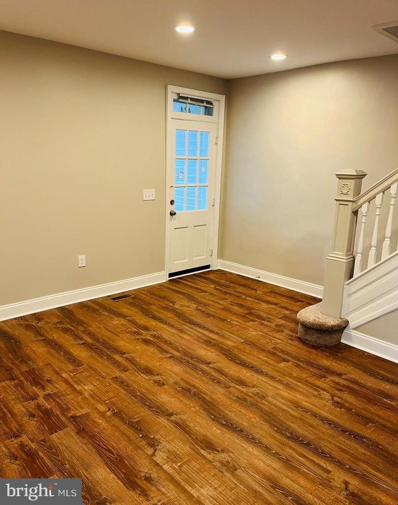 424 North Springfield Road Clifton Heights, PA 19018 - Photo 8 of 24 a view of an empty room with wooden floor