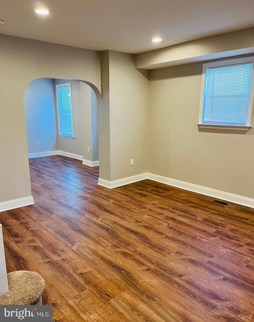 424 North Springfield Road Clifton Heights, PA 19018 - Photo 9 of 24 a view of an empty room with wooden floor