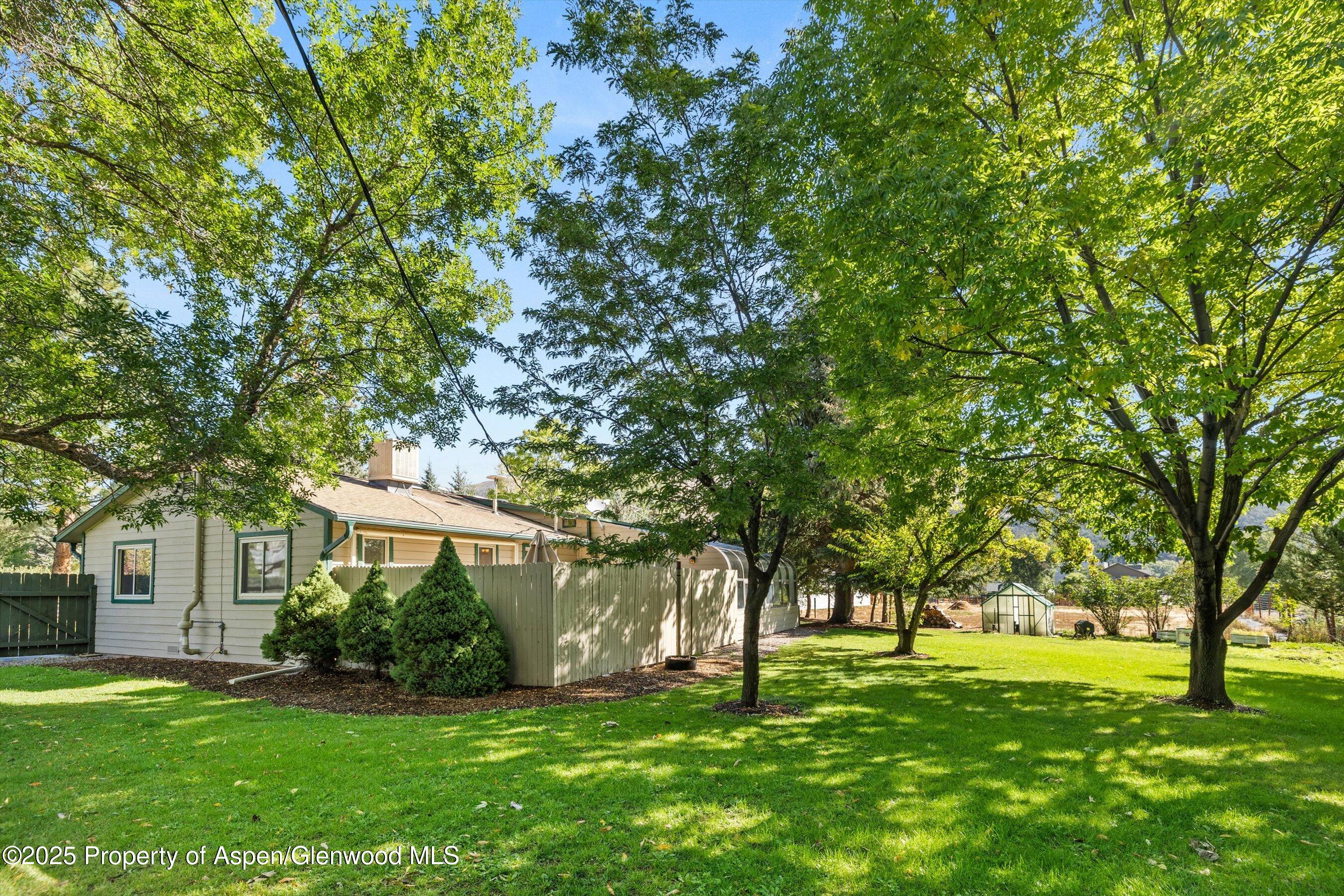 128 Hopi Carbondale, CO 81623 - Photo 37 of 43 View of enclosed patio and lawn