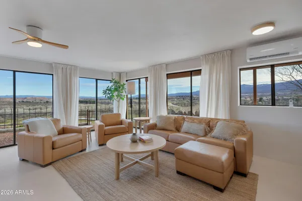 a view of a chairs and table in the terrace