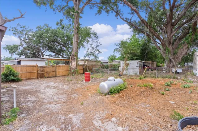 a view of a backyard with a garden
