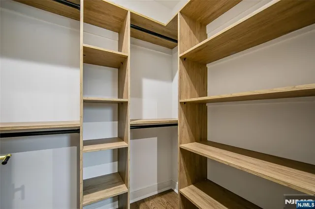a kitchen with a sink appliances and a counter top space