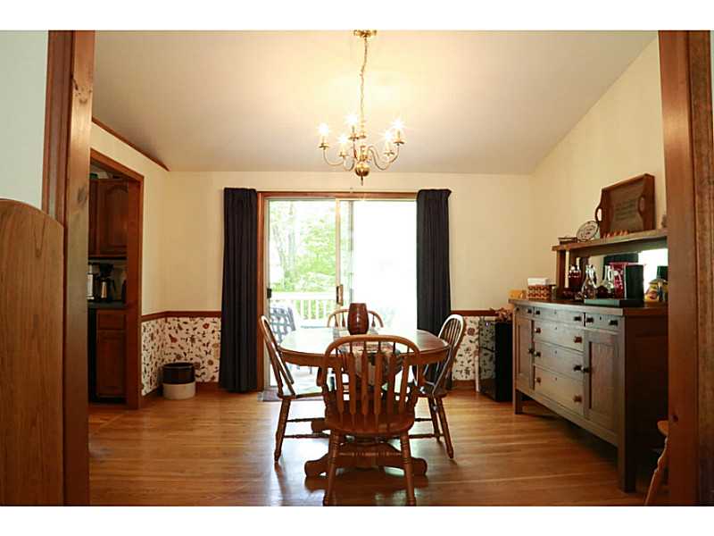 60 North Cobble Hill Road Warwick, RI 02886 - Photo 6 of 20 Dining Room. dining room with slider leading to back deck
