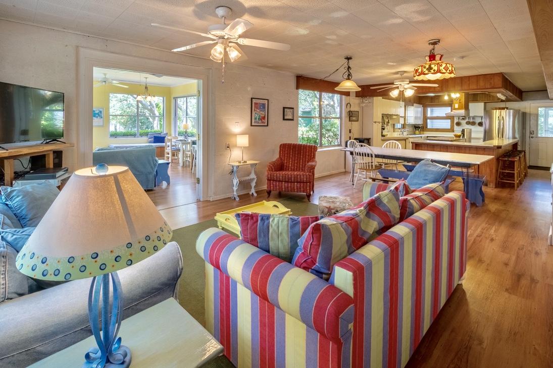79 Garfield Street Santa Rosa Beach, FL 32459 - Photo 18 of 49 a living room filled with furniture and a flat screen tv