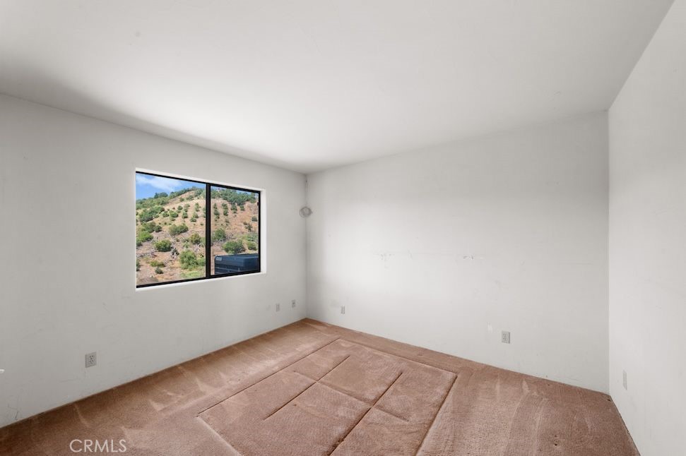 879 Stewart Canyon Road Fallbrook, CA 92028 - Photo 16 of 75 an empty room with windows