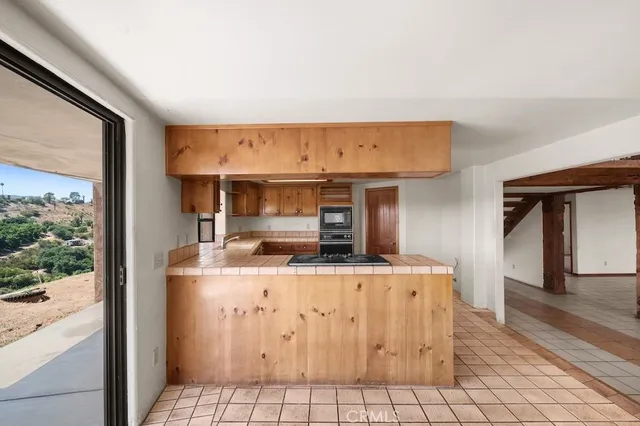 a view of balcony with furniture
