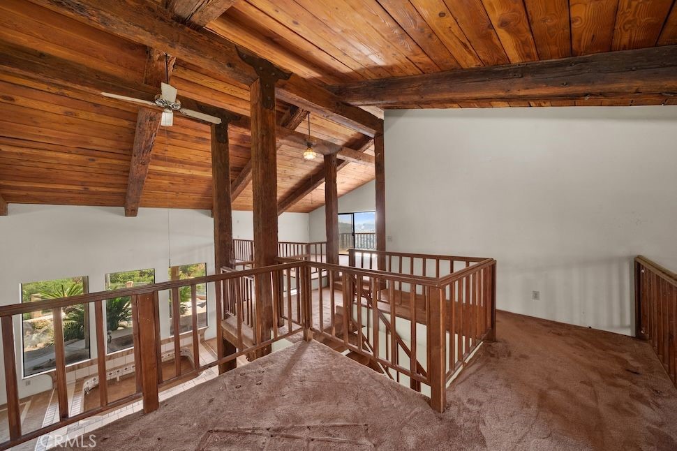 879 Stewart Canyon Road Fallbrook, CA 92028 - Photo 24 of 75 a view of a room with racks on the wall