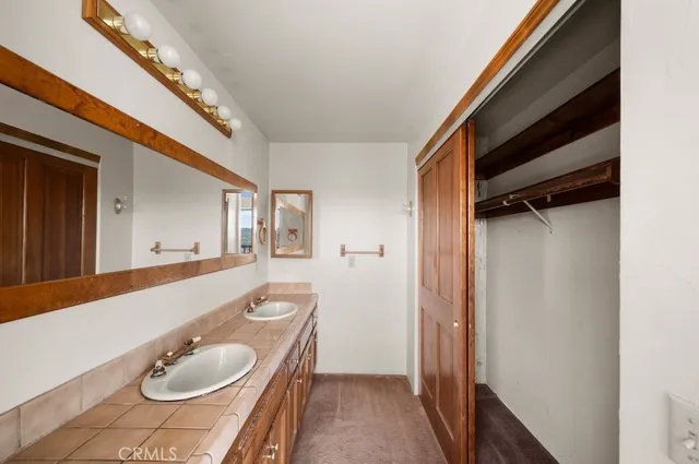 a bathroom with a sink and a toilet
