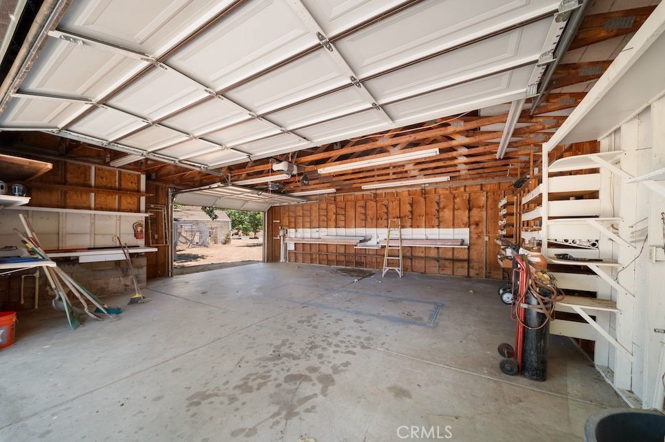 879 Stewart Canyon Road Fallbrook, CA 92028 - Photo 46 of 75 a view of empty room with wooden ceiling