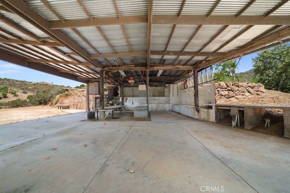 879 Stewart Canyon Road Fallbrook, CA 92028 - Photo 52 of 75 a view of a water heater room with a garage