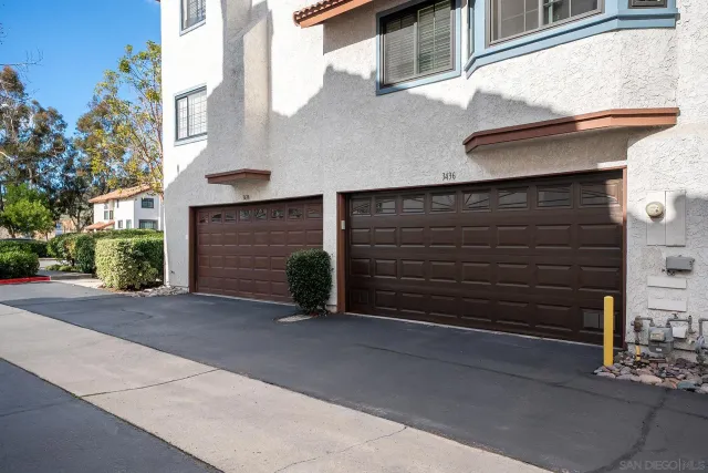 front view of a house with a street
