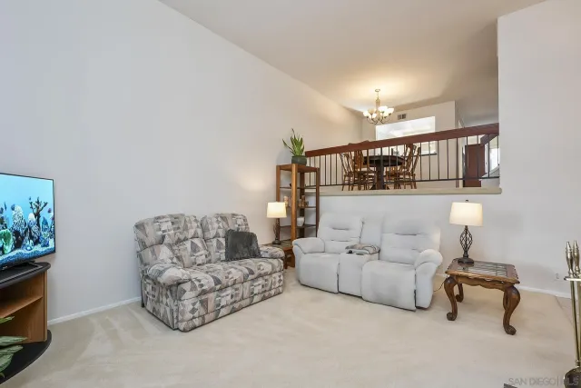 a living room with furniture and a couch