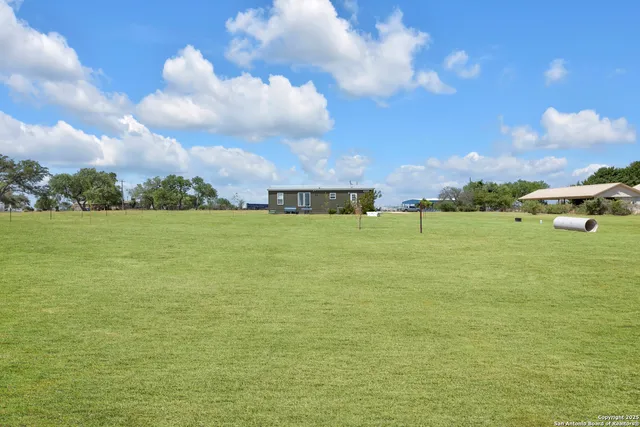 a view of a fountain with an outdoor space
