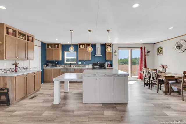a kitchen with counter top space and appliances