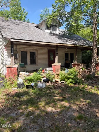 a front view of a house with yard