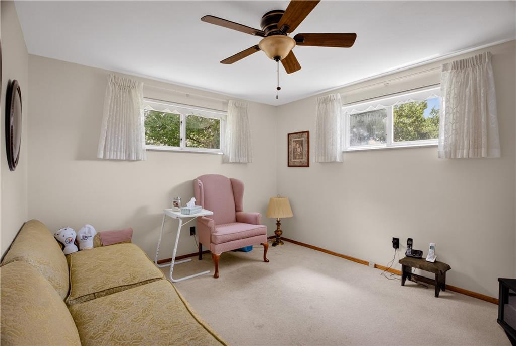 186 William Street McKees Rocks, PA 15136 - Photo 22 of 45 a living room with furniture and a window