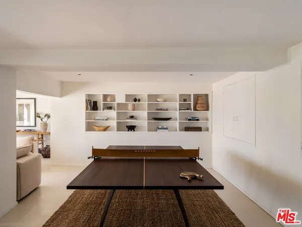 a view of a patio with swimming pool