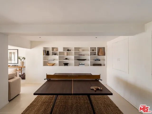 a view of a patio with swimming pool