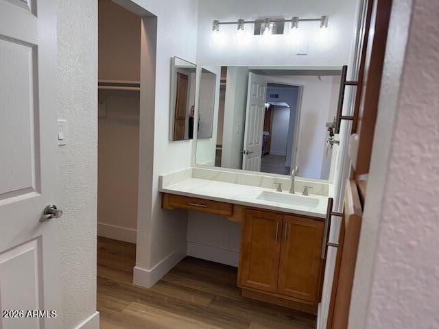 3825 East Camelback Road, Unit 226 Phoenix, AZ 85018 - Photo 12 of 20 a bathroom with a double vanity sink and a mirror
