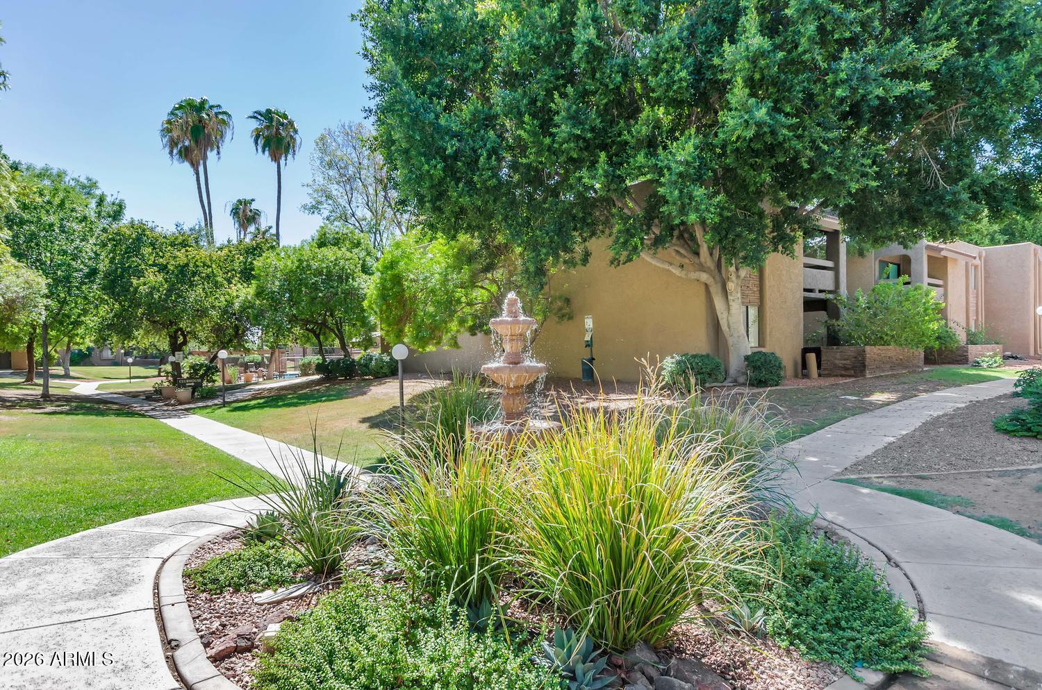 3825 East Camelback Road, Unit 226 Phoenix, AZ 85018 - Photo 3 of 20 a view of a swimming pool with a patio
