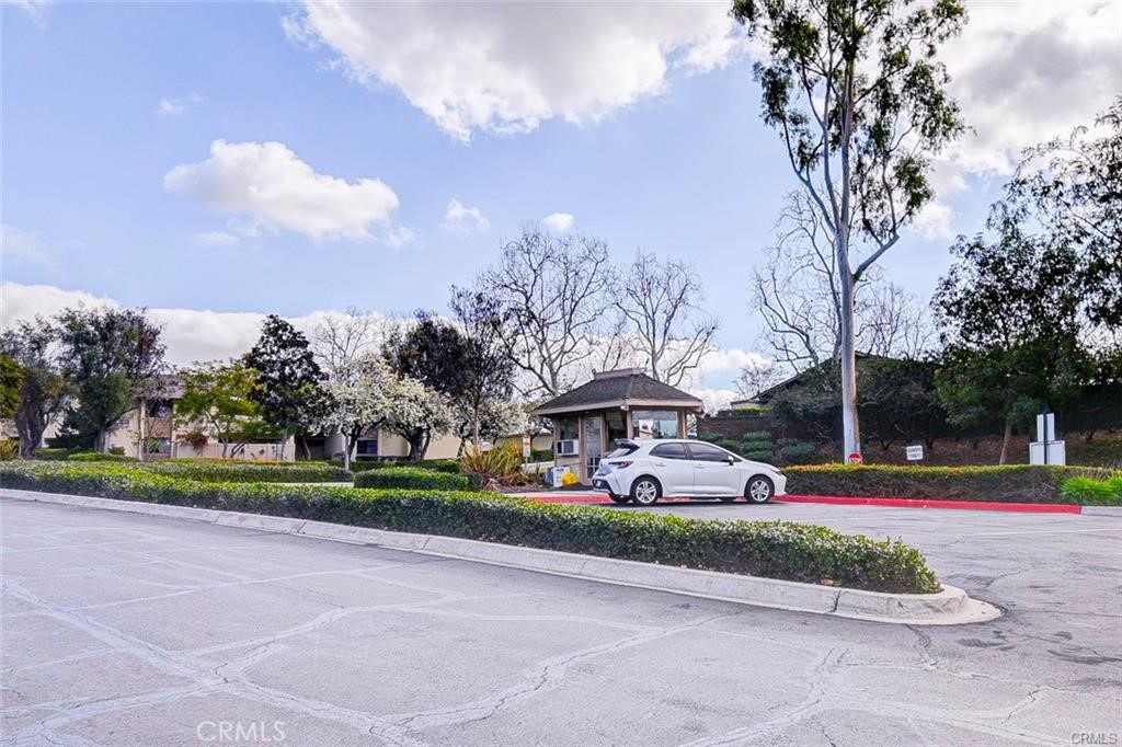 13556 La Jolla Circle, Unit 208H La Mirada, CA 90638 - Photo 21 of 39 a view of a parked cars in front of a house