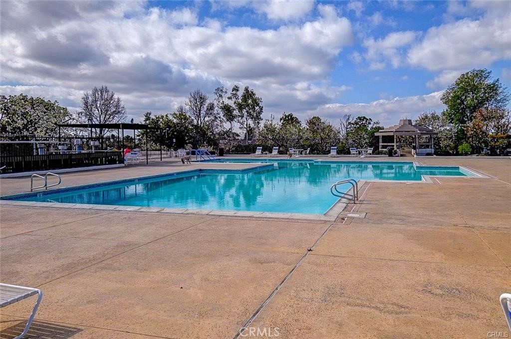 13556 La Jolla Circle, Unit 208H La Mirada, CA 90638 - Photo 27 of 39 a view of a lake with a yard