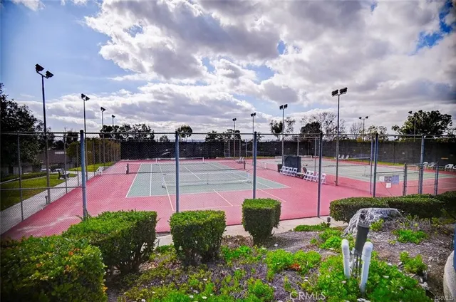 a view of swimming pool with a yard