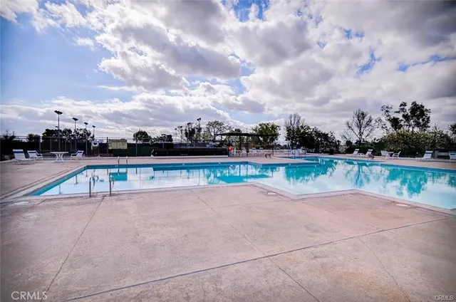 a front view of a house with table and chairs