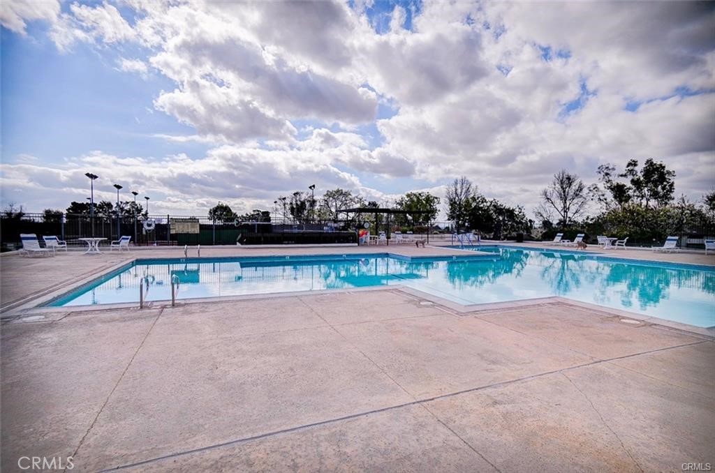 13556 La Jolla Circle, Unit 208H La Mirada, CA 90638 - Photo 33 of 39 a view of swimming pool with a yard