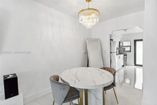 a view of a dining room with furniture