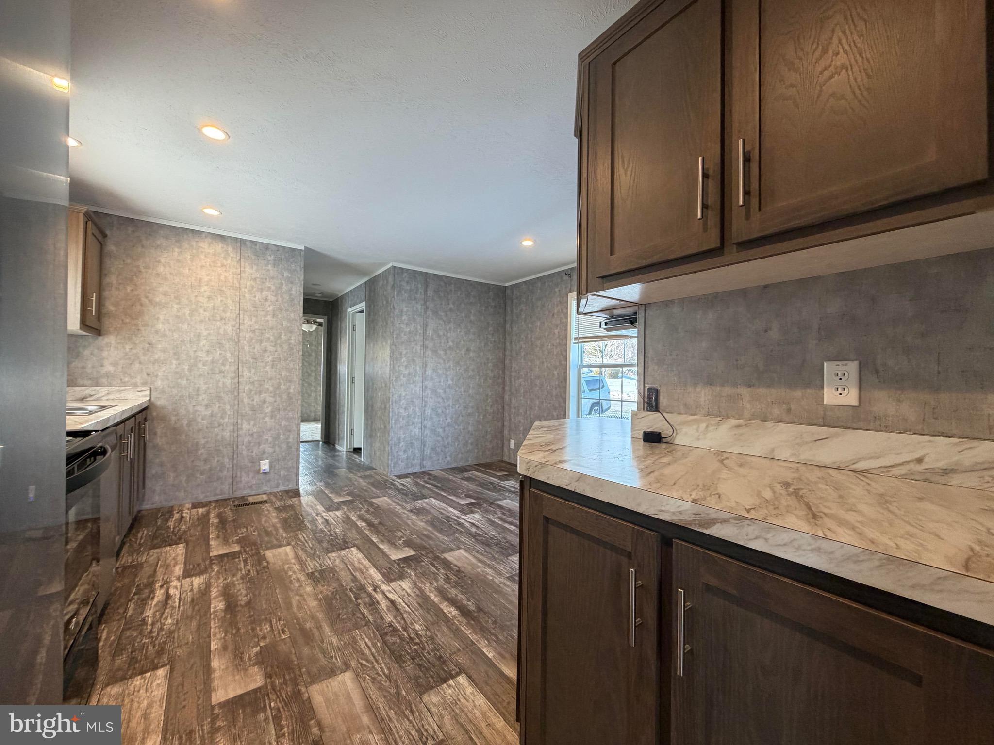 425 Cider Press Road Lock Haven, PA 17745 - Photo 15 of 38 a kitchen with granite countertop a sink and cabinets