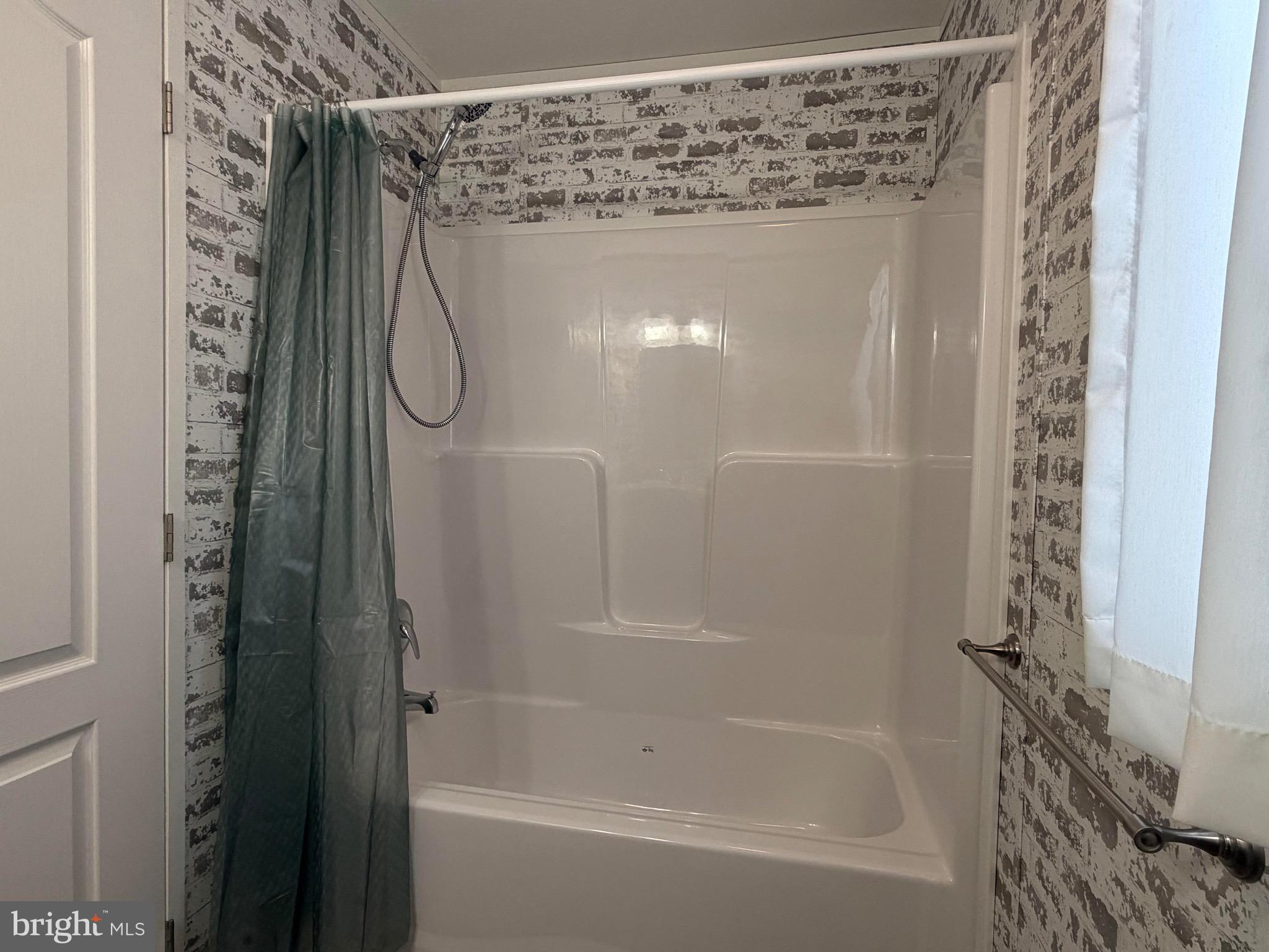 425 Cider Press Road Lock Haven, PA 17745 - Photo 26 of 38 a bathroom with a shower and a bath tub
