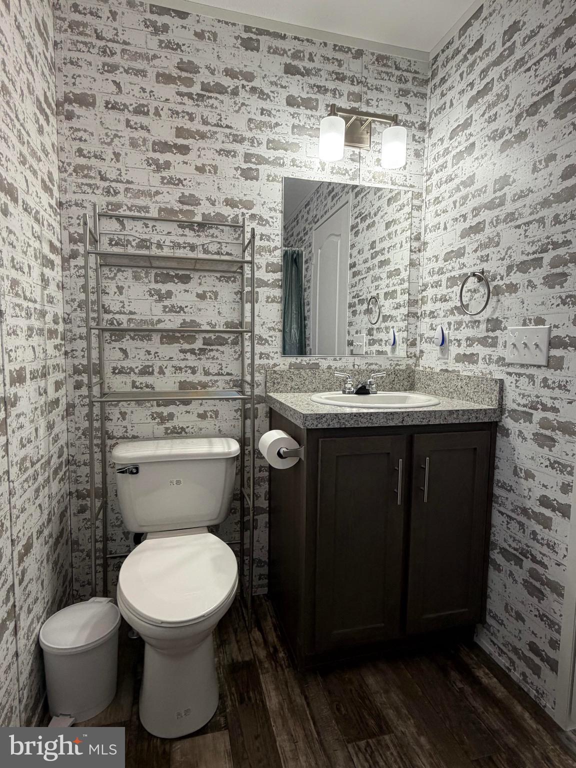 425 Cider Press Road Lock Haven, PA 17745 - Photo 28 of 38 a bathroom with a toilet a sink and mirror