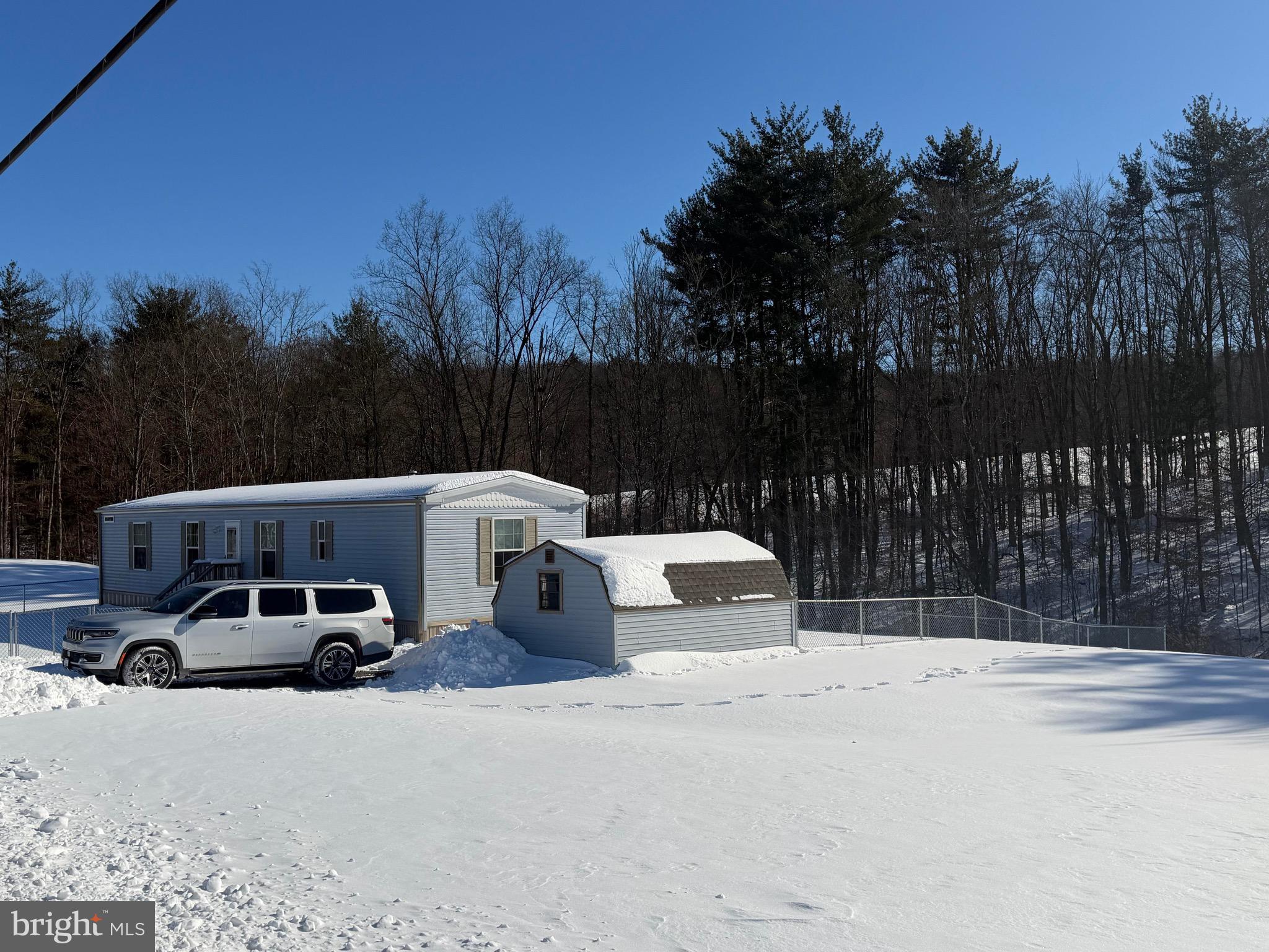425 Cider Press Road Lock Haven, PA 17745 - Photo 6 of 38 a car parked on the side of the road
